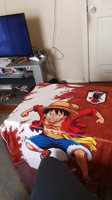 Foto de un comprador: Playera de futbol de Luffy de One Piece Japón, niños y adultos