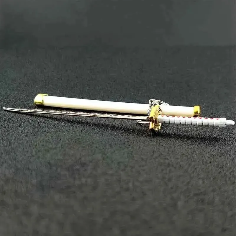 Disfraz de Zoro: llavero de mini espada con vaina de plástico – Revisa la espada
