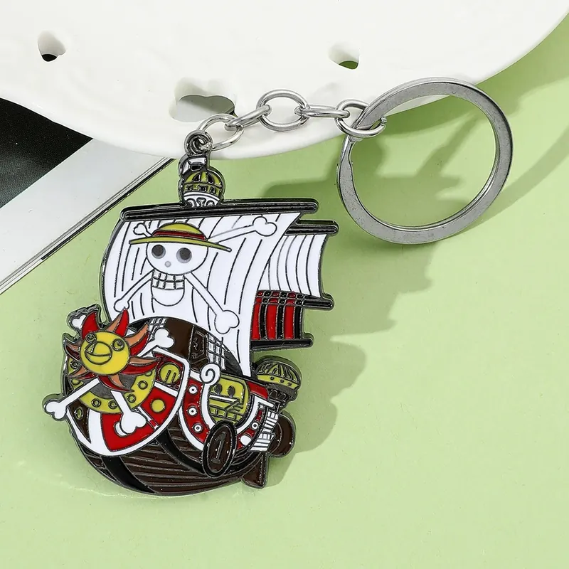 Llavero de metal de One Piece con Luffy, Ace y Law – Ábrelo