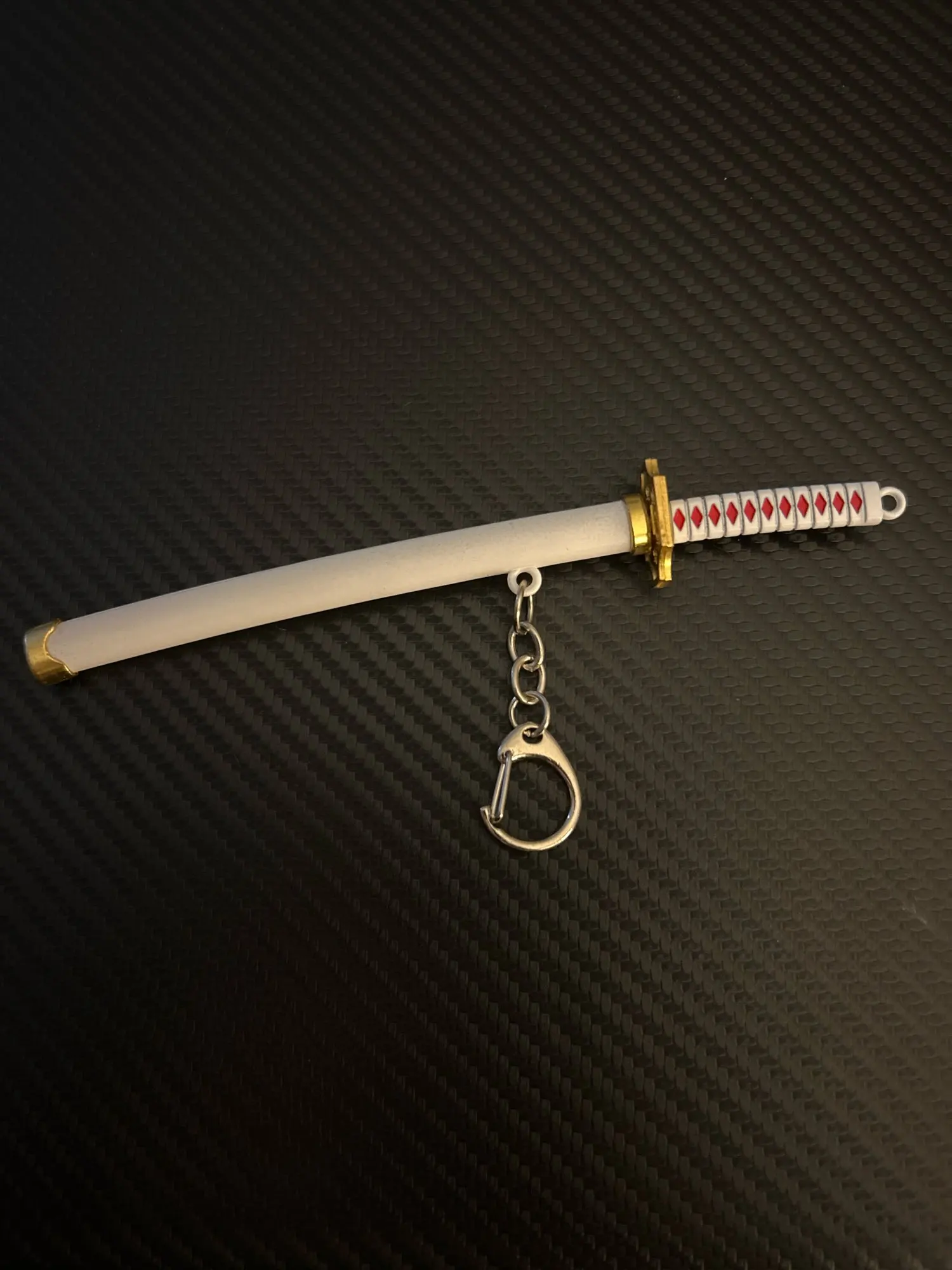 Foto de un comprador: Disfraz de Zoro: llavero de mini espada con vaina de plástico