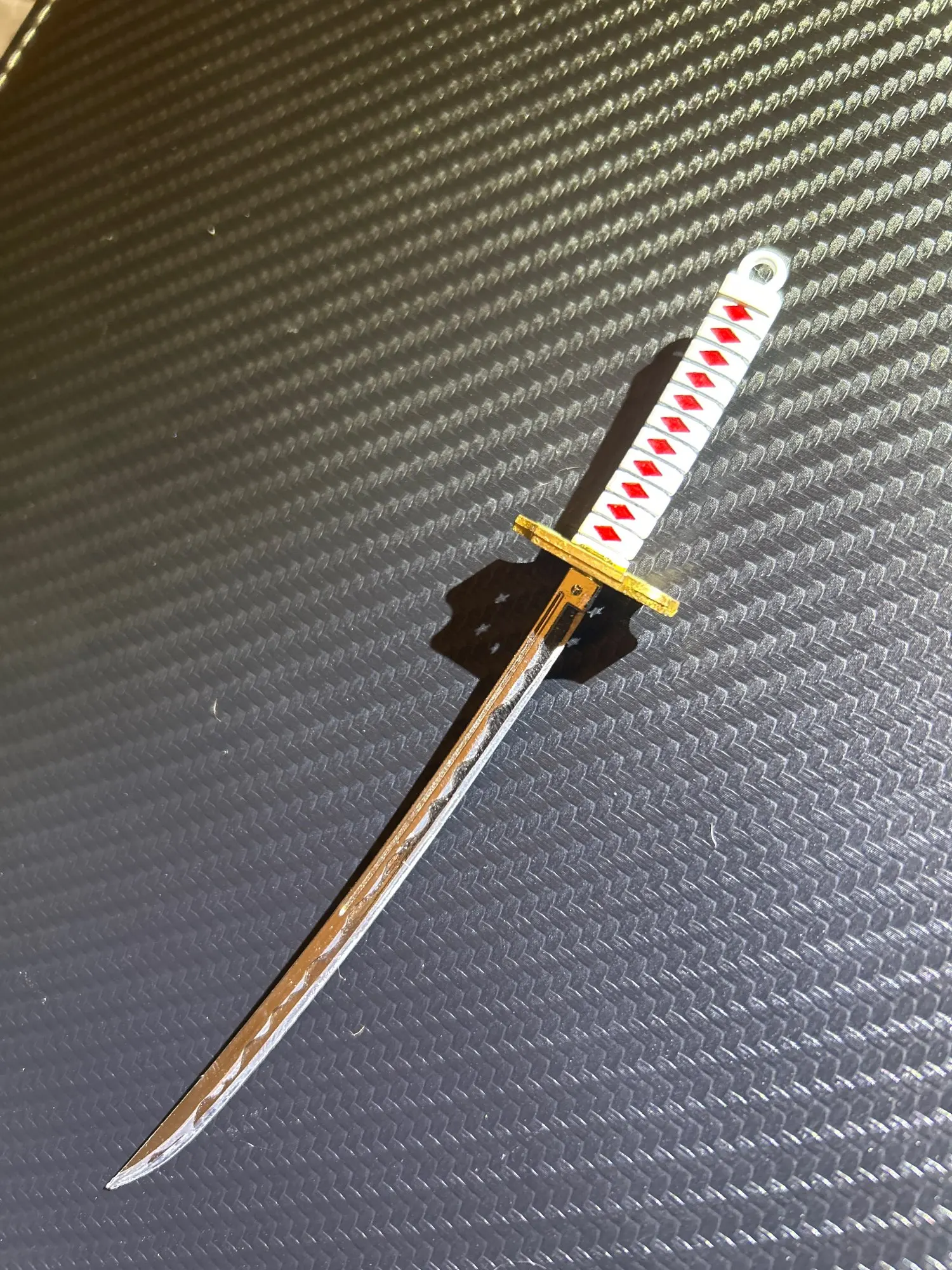 Foto de un comprador: Disfraz de Zoro: llavero de mini espada con vaina de plástico