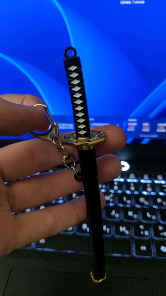Foto de un comprador: Disfraz de Zoro: llavero de mini espada con vaina de plástico