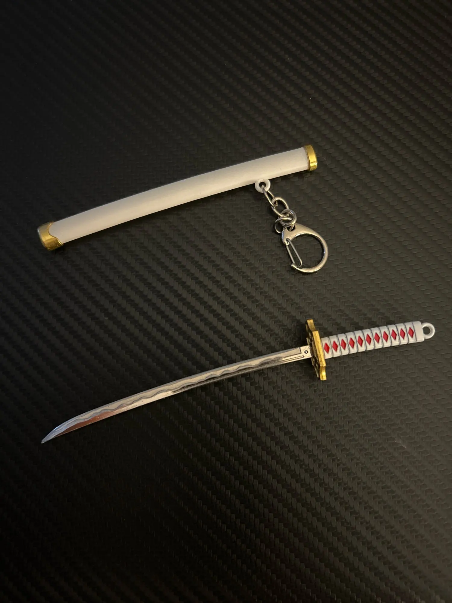 Foto de un comprador: Disfraz de Zoro: llavero de mini espada con vaina de plástico