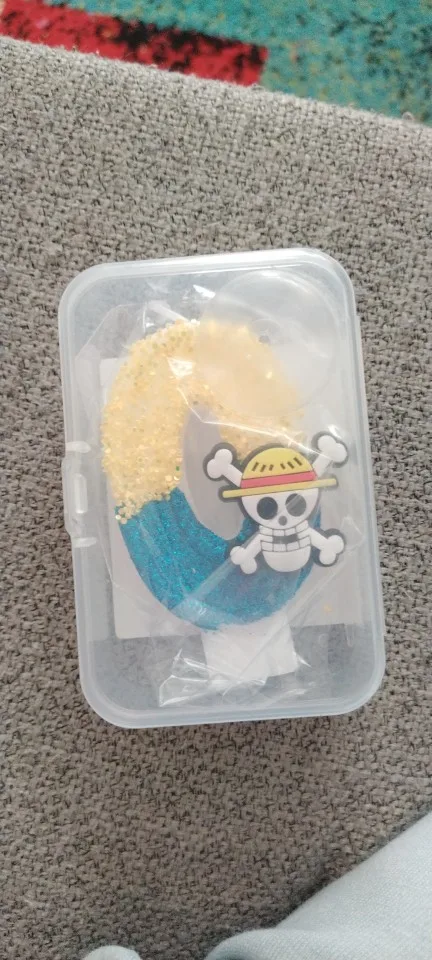 Foto de un comprador: Velas de One Piece con números del 0 al 9 y Luffy